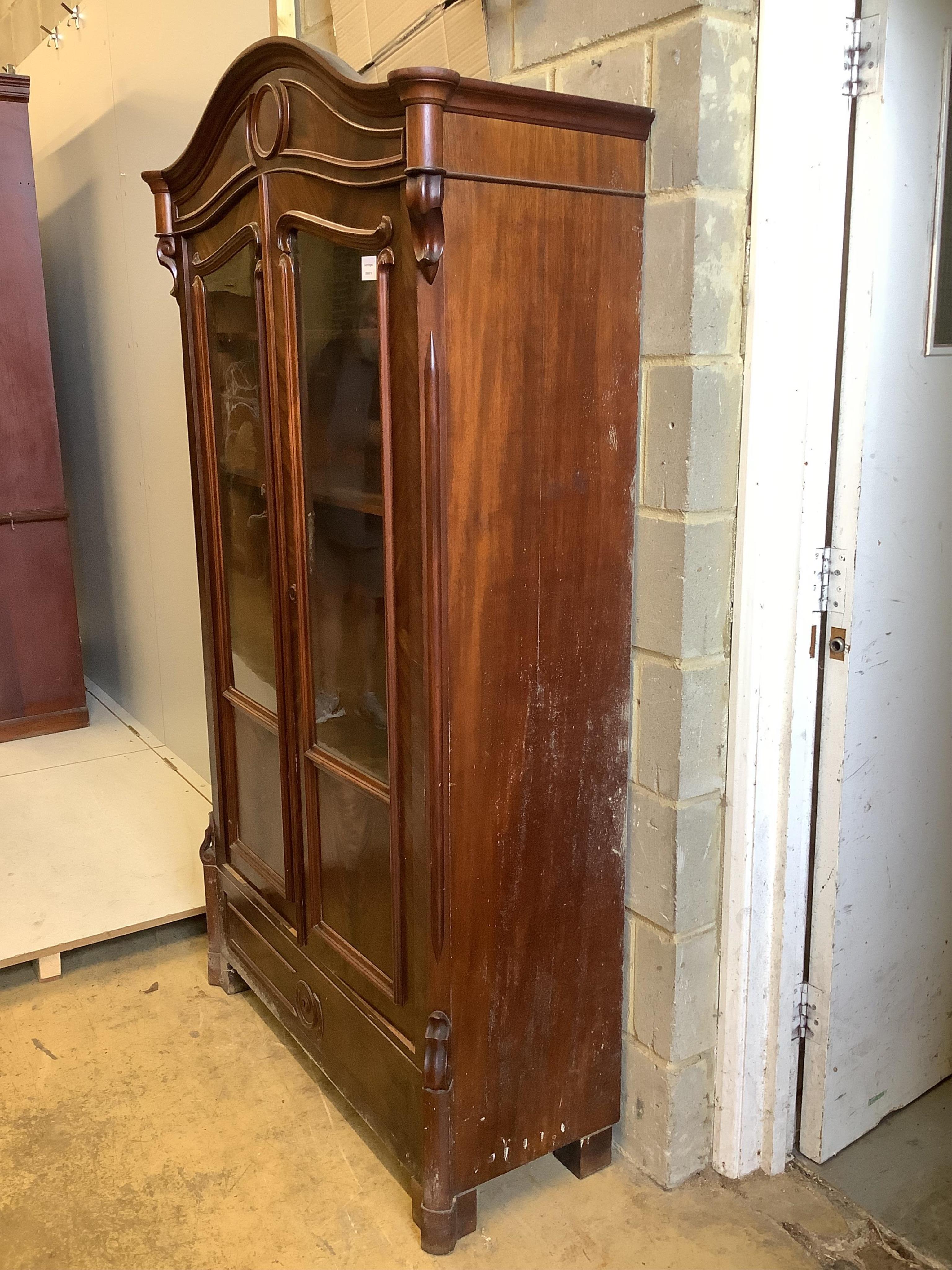 A small 19th century French glazed mahogany armoire, width 104cm, depth 41cm, height 186cm. Condition - fair